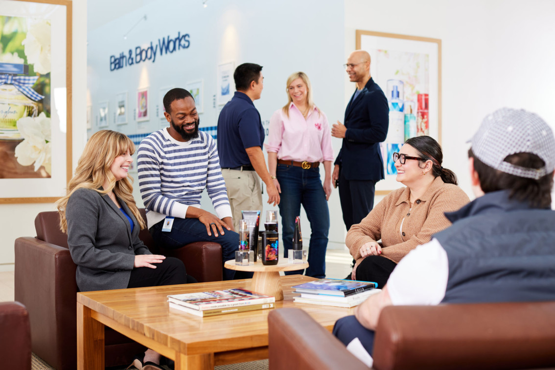 Several BBW team members conversing at corporate office